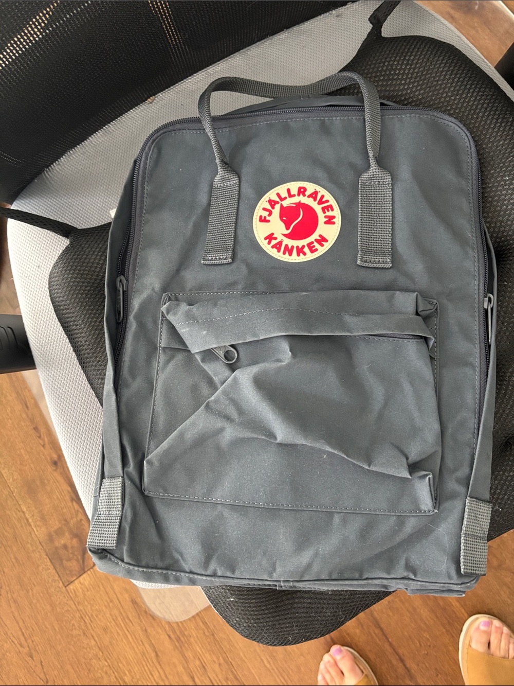 Fjallraven Kånken Backpack in Black with Red Logo Patch